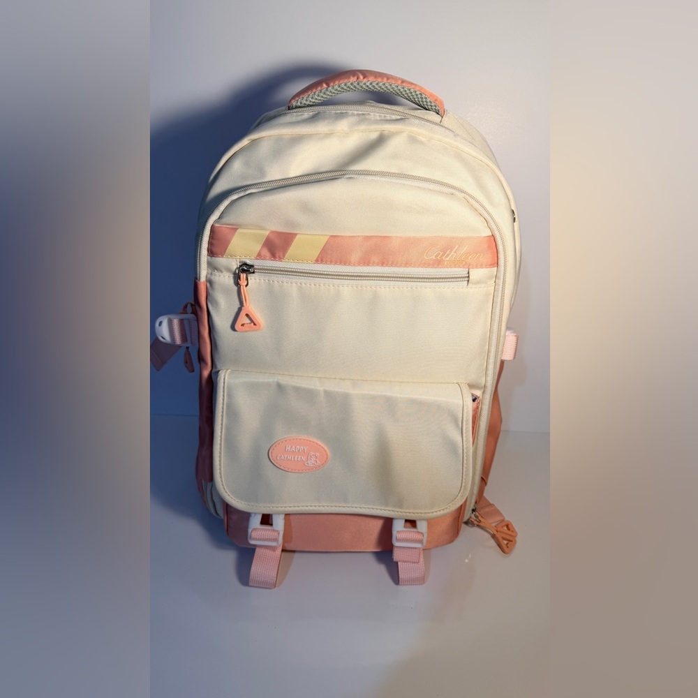 Cream and Pink Backpack by Happy Cathleen.
